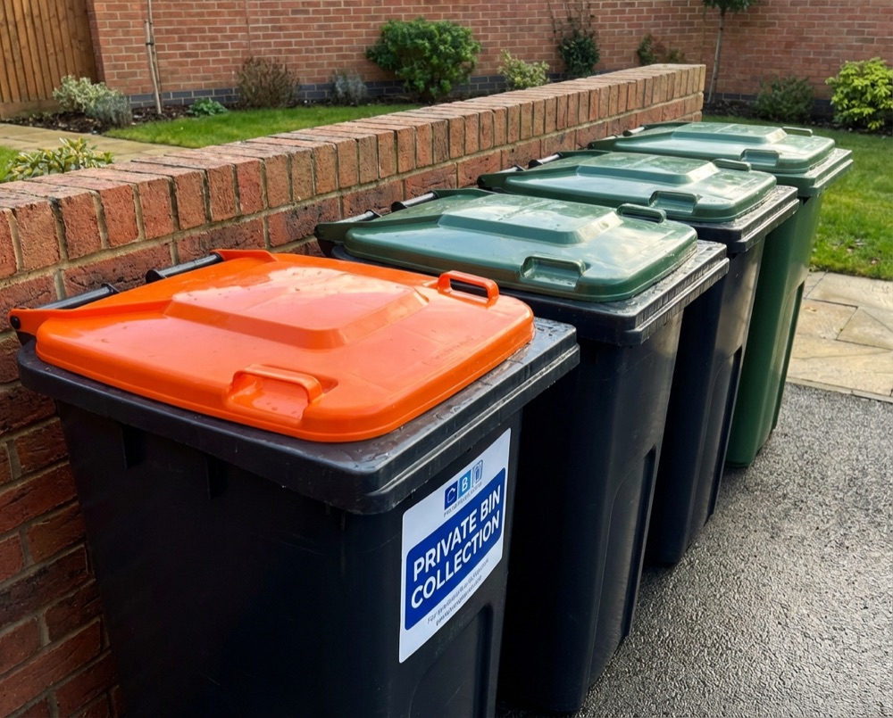 Recycling and general waste bins on a Aldingbourne street