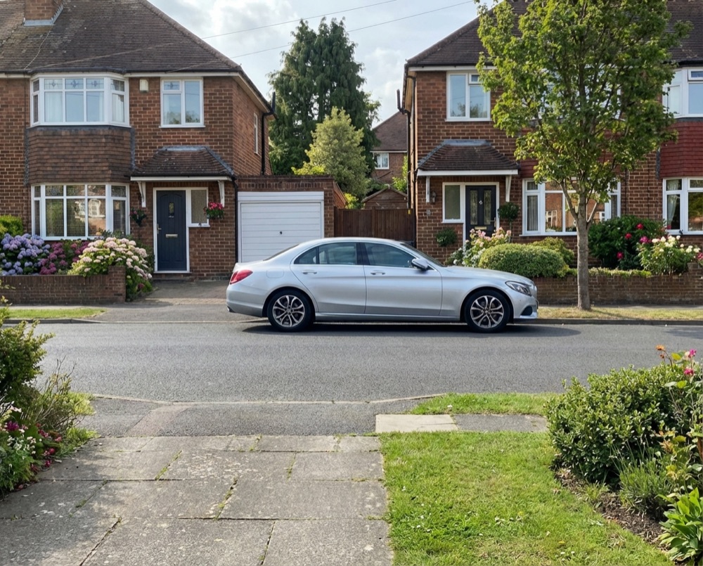 Residential street in Aldingbourne with wheelie bins